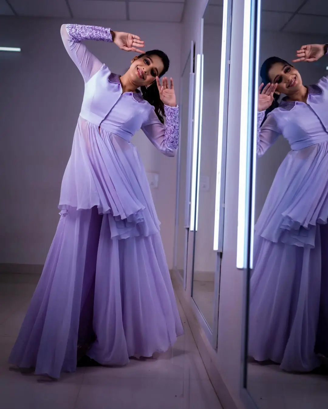 ETV Anchor Rashmi Gautam Photos In Violet Gown